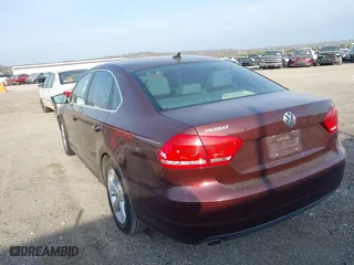 2013 Volkswagen Passat SE w/Sunroof with VIN 1VWBH7A35DC150285, listed as a IAAI auction lot 38970420 with 160,374 mi miles. Bid and sale history available at carsss.com. Image 3.