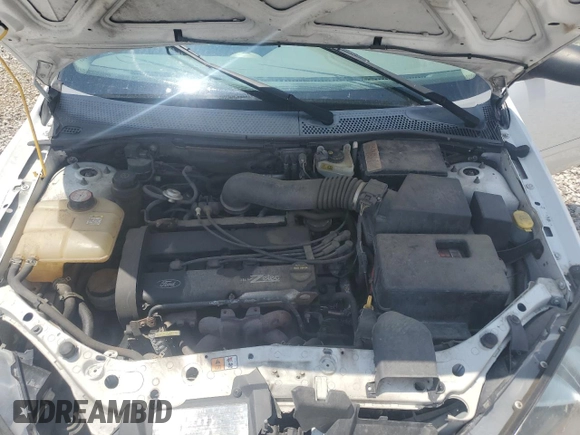 2003 Ford Focus SE with VIN 1FAFP34353W231334, listed as a Copart auction lot 63844205 with 86,601 mi miles and Salvage title. Bid and sale history available at DreamBid. Image 11.