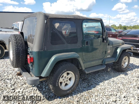 2001 Jeep Wrangler Sahara with VIN 1J4FA59S61P373670, listed as a Copart auction lot 74060614 with 176,111 mi miles and Clean Title. Bid and sale history available at carsss.com. Image 3.