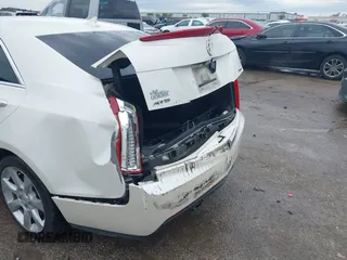 2014 Cadillac ATS Standard RWD with VIN 1G6AA5RX0E0185448, listed as a IAAI auction lot 41910150 with 179,969 mi miles and . Bid and sale history available at DreamBid. Image 6.