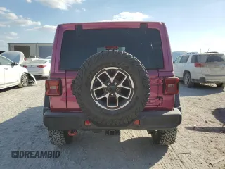 2024 Jeep Wrangler Rubicon with VIN 1C4PJXFG9RW346079, listed as a Copart auction lot 77006914 with 2,446 mi miles and Salvage Title. Bid and sale history available at DreamBid. Image 6.