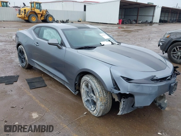 2020 Chevrolet Camaro 1LT z VIN 1G1FB1RX9L0128079, wystawiony jako IAAI lot #41173693 z przebiegiem 88 846 mil mil oraz . Historia ofert i sprzedaży dostępna na DreamBid. Obrazek 1.