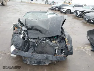 2002 Toyota MR2 Spyder with VIN JTDFR320720045244, listed as a IAAI auction lot 40486938 with 61,802 mi miles. Bid and sale history available at carsss.com. Image 13.