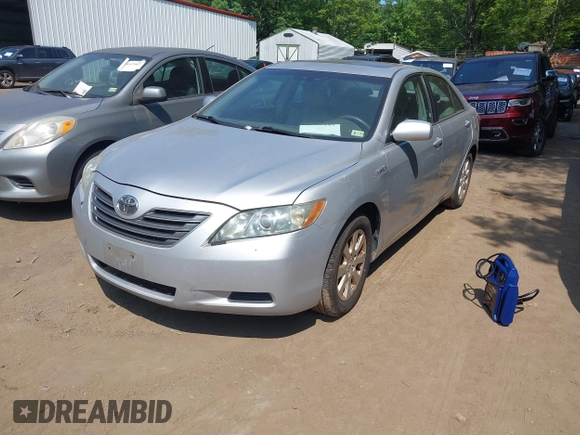 2007 Toyota Camry with VIN 4T1BB46KX7U020015, listed as a IAAI auction lot 42411157 with 256,430 mi miles and . Bid and sale history available at DreamBid. Image 2.