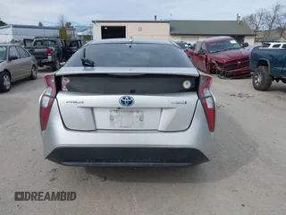 2016 Toyota Prius Two with VIN JTDKBRFUXG3023523, listed as a IAAI auction lot 41757143 with 124,144 mi miles. Bid and sale history available at carsss.com. Image 16.