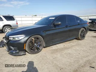 2019 BMW M5 z VIN WBSJF0C53KB447108, wystawiony jako Copart lot #51024275 z przebiegiem 58 387 mil mil oraz Szkoda całkowita • Salvage title. Historia ofert i sprzedaży dostępna na DreamBid. Obrazek 1.