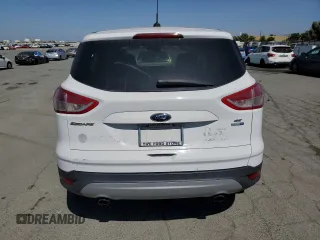 2014 Ford Escape SE z VIN 1FMCU9GX2EUE42010, wystawiony jako Copart lot #59228265 z przebiegiem 107 863 mil mil oraz Czysty tytuł • Clean title. Historia ofert i sprzedaży dostępna na DreamBid. Obrazek 6.