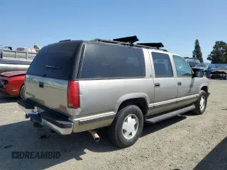 1999 GMC Suburban with VIN 3GKFK16R4XG509485, listed as a Copart auction lot 52611275 with 147,081 mi miles and Clean Title. Bid and sale history available at carsss.com. Image 3.