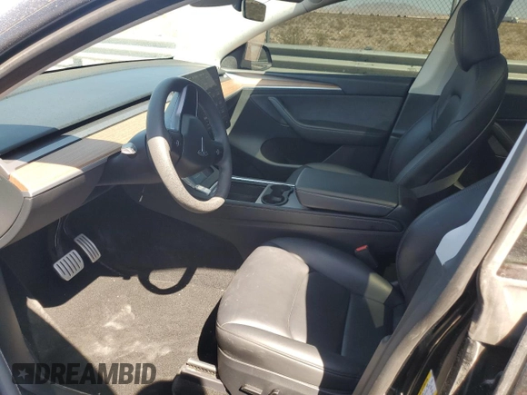 2023 Tesla Model Y Performance with VIN 7SAYGDEF8PF925238, listed as a Copart auction lot 46276925 with 28,201 mi miles and Salvage Title. Bid and sale history available at DreamBid. Image 7.