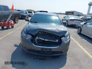 2015 Ford Taurus SEL with VIN 1FAHP2H81FG123199, listed as a IAAI auction lot 42431645 with 183,456 mi miles and . Bid and sale history available at DreamBid. Image 12.
