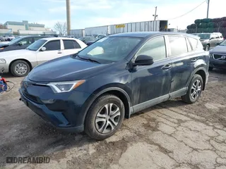 2018 Toyota RAV4 LE with VIN JTMBFREV5JD253342, listed as a IAAI auction lot 41656581 with 243,791 mi miles. Bid and sale history available at carsss.com. Image 18.