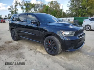 2018 Dodge Durango GT with VIN 1C4RDHDG2JC494203, listed as a Copart auction lot 50637665 with 144,777 mi miles and Salvage title. Bid and sale history available at DreamBid. Image 4.