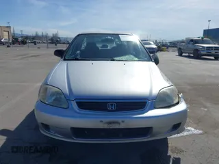 1999 Honda Civic LX with VIN JHMEJ6670XS000958, listed as a IAAI auction lot 41620949 with 93,698 mi miles and . Bid and sale history available at DreamBid. Image 12.