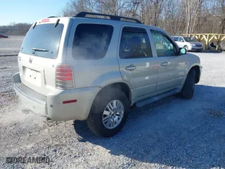 2006 Mercury Mariner Luxury with VIN 4M2CU56156DJ05613, listed as a IAAI auction lot 41305481 with 164,896 mi miles. Bid and sale history available at carsss.com. Image 4.