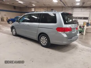 2009 Honda Odyssey EX-L with VIN 5FNRL38789B015524, listed as a IAAI auction lot 42135465 with 242,005 mi miles. Bid and sale history available at carsss.com. Image 3.