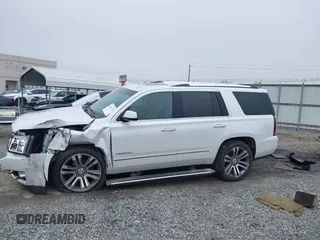 2019 GMC Yukon Denali with VIN 1GKS1CKJ7KR364240, listed as a IAAI auction lot 41645374 with 104,956 mi miles. Bid and sale history available at carsss.com. Image 14.