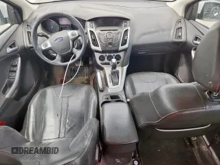 2013 Ford Focus SE with VIN 1FADP3F20DL289978, listed as a Copart auction lot 63350585 with 211,677 mi miles and Salvage title. Bid and sale history available at DreamBid. Image 8.