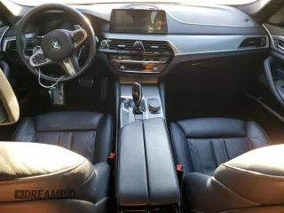 2019 BMW 5 Series M550i xDrive with VIN WBAJB9C55KB288709, listed as a Copart auction lot 46590735 with 58,256 mi miles and Salvage title. Bid and sale history available at DreamBid. Image 8.