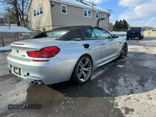 2013 BMW M6 z VIN WBSLZ9C50DDZ78195, wystawiony jako Copart lot #42772235 z przebiegiem 84 529 mil mil oraz Czysty tytuł • Clean title. Historia ofert i sprzedaży dostępna na DreamBid. Obrazek 3.