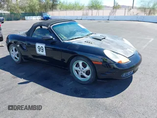 1998 Porsche Boxster with VIN WP0CA2980WU622968, listed as a IAAI auction lot 42843553 with Not provided miles and . Bid and sale history available at DreamBid. Image 1.