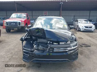 2021 Volkswagen Tiguan SE with VIN 3VV3B7AX3MM157702, listed as a IAAI auction lot 41888479 with 51,807 mi miles and . Bid and sale history available at DreamBid. Image 11.