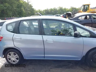 2009 Honda Fit with VIN JHMGE88209S052443, listed as a IAAI auction lot 42406572 with 140,343 mi miles and . Bid and sale history available at DreamBid. Image 12.