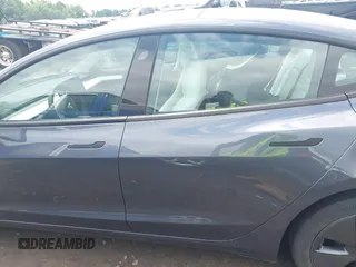 2023 Tesla Model 3 with VIN 5YJ3E1EAXPF628911, listed as a IAAI auction lot 42362410 with 25,387 mi miles and . Bid and sale history available at DreamBid. Image 15.