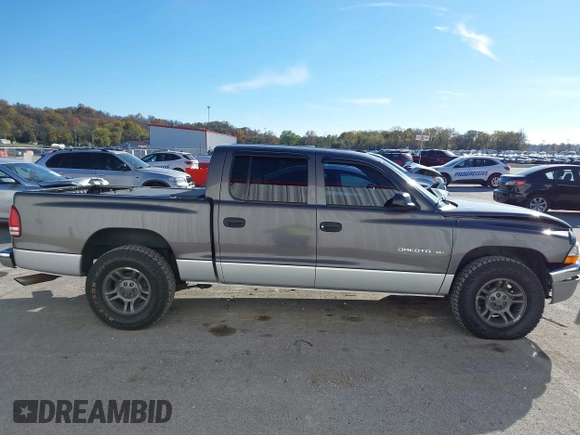 2001 Dodge Dakota Sport with VIN 1B7HL2AN21S319390, listed as a IAAI auction lot 40836729 with 118,823 mi miles. Bid and sale history available at carsss.com. Image 13.