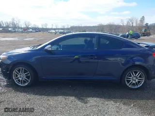 2006 Scion tC with VIN JTKDE177060128395, listed as a IAAI auction lot 41934031 with 181,740 mi miles. Bid and sale history available at carsss.com. Image 15.
