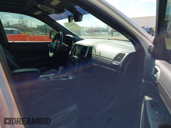 2017 Jeep Grand Cherokee Laredo with VIN 1C4RJFAG9HC824883, listed as a IAAI auction lot 41876117 with 141,067 mi miles. Bid and sale history available at carsss.com. Image 5.