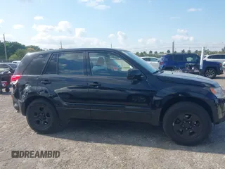 2008 Suzuki Grand Vitara with VIN JS3TE941284102380, listed as a IAAI auction lot 42061609 with 103,554 mi miles and . Bid and sale history available at DreamBid. Image 13.
