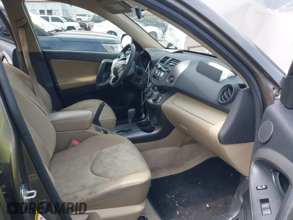 2009 Toyota RAV4 with VIN JTMZF33V69D015171, listed as a IAAI auction lot 42006163 with 122,927 mi miles. Bid and sale history available at carsss.com. Image 5.