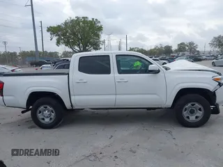 2022 Toyota Tacoma SR with VIN 3TMCZ5AN7NM470444, listed as a IAAI auction lot 41729041 with 34,248 mi miles and . Bid and sale history available at DreamBid. Image 14.