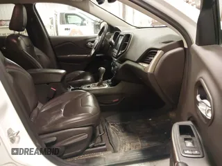 2014 Jeep Cherokee Trailhawk with VIN 1C4PJMBS5EW159912, listed as a IAAI auction lot 41538254 with 166,955 mi miles. Bid and sale history available at carsss.com. Image 5.