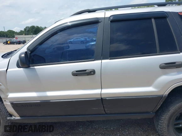 2002 Jeep Grand Cherokee Laredo with VIN 1J4GX48S32C288387, listed as a IAAI auction lot 42212249 with 151,028 mi miles and . Bid and sale history available at DreamBid. Image 15.