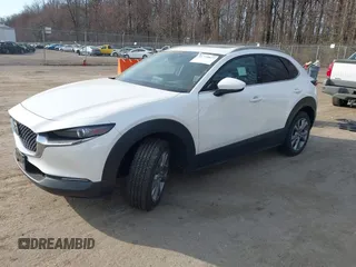 2022 Mazda CX-30 S Premium with VIN 3MVDMBDL7NM412263, listed as a IAAI auction lot 41779877 with 42,088 mi miles and . Bid and sale history available at carsss.com. Image 16.