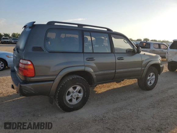 2000 Toyota Land Cruiser z VIN JT3HT05J9Y0123937, wystawiony jako Copart lot #56599145 z przebiegiem 132 262 mil mil oraz Szkoda całkowita • Salvage title. Historia ofert i sprzedaży dostępna na DreamBid. Obrazek 3.
