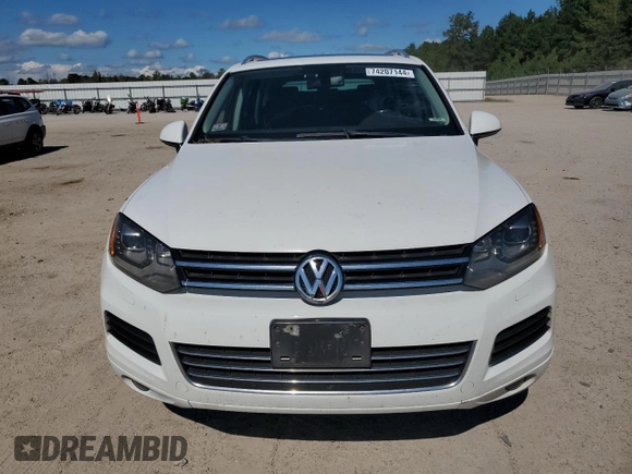 2014 Volkswagen Touareg Lux z VIN WVGEF9BP4ED011436, wystawiony jako Copart lot #74207144 z przebiegiem 207 059 mil mil oraz Szkoda całkowita • Salvage title. Historia ofert i sprzedaży dostępna na DreamBid. Obrazek 5.