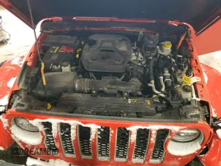 2021 Jeep Wrangler Unlimited Sahara z VIN 1C4JJXP64MW786392, wystawiony jako Copart lot #51800875 z przebiegiem 147 378 mil mil oraz Szkoda całkowita • Salvage title. Historia ofert i sprzedaży dostępna na DreamBid. Obrazek 11.