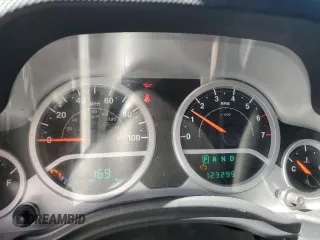 2010 Jeep Wrangler Unlimited Rubicon with VIN 1J4BA6H12AL107485, listed as a Copart auction lot 48802825 with 123,299 mi miles and Salvage title. Bid and sale history available at DreamBid. Image 9.