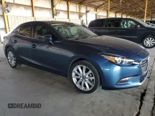 2017 Mazda 3 Touring with VIN 3MZBN1V71HM100524, listed as a Copart auction lot 61054585 with 100,917 mi miles and Clean title. Bid and sale history available at DreamBid. Image 4.