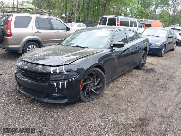 2016 Dodge Charger SXT with VIN 2C3CDXHG6GH332854, listed as a IAAI auction lot 42094761 with 114,883 mi miles. Bid and sale history available at carsss.com. Image 2.