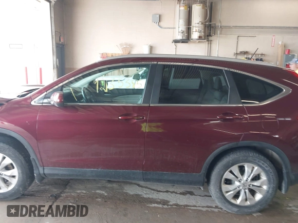 2014 Honda CR-V EX-L with VIN 5J6RM4H75EL103256, listed as a IAAI auction lot 42135385 with 104,465 mi miles. Bid and sale history available at carsss.com. Image 15.