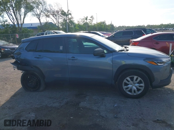 2023 Toyota Corolla Cross L with VIN 7MUAAAAG4PV044969, listed as a IAAI auction lot 42388727 with 26,071 mi miles and . Bid and sale history available at DreamBid. Image 6.