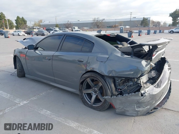 2019 Dodge Charger SRT Hellcat with VIN 2C3CDXL95KH725925, listed as a IAAI auction lot 39012995 with Not Provided miles and . Bid and sale history available at DreamBid. Image 3.