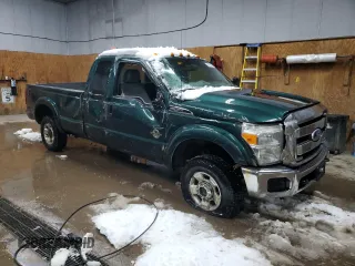 2011 Ford F-250 XL with VIN 1FT7X2BT3BEA11867, listed as a Copart auction lot 82906164 with 206,888 mi miles and Salvage Title. Bid and sale history available at DreamBid. Image 4.