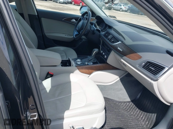 2016 Audi A6 2.0T Premium Plus with VIN WAUGFAFC7GN095669, listed as a IAAI auction lot 41894313 with 84,725 mi miles. Bid and sale history available at carsss.com. Image 5.