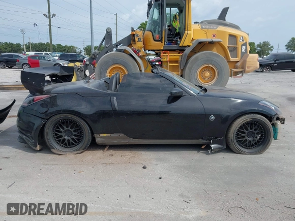 2004 Nissan 350Z Touring z VIN JN1AZ36A14M253275, wystawiony jako IAAI lot #42181345 z przebiegiem 63 886 mil mil oraz . Historia ofert i sprzedaży dostępna na DreamBid. Obrazek 14.