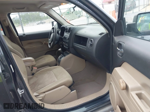 2011 Jeep Patriot Latitude with VIN 1J4NT1GA0BD129377, listed as a IAAI auction lot 42098404 with 212,834 mi miles. Bid and sale history available at carsss.com. Image 5.