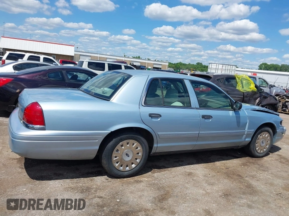 2008 Ford Crown Victoria z VIN 2FAFP73V28X126398, wystawiony jako IAAI lot #42349725 z przebiegiem Nie podano mil oraz . Historia ofert i sprzedaży dostępna na DreamBid. Obrazek 13.